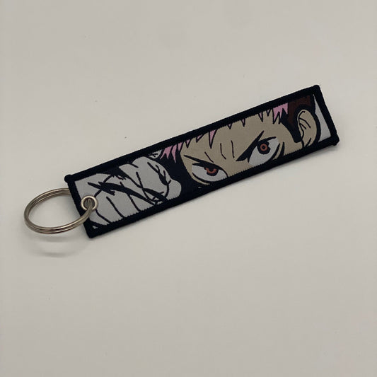 LIMITED JUJUTSU KAISEN YUJI ITADORI SUKUNA DUAL-SIDED EMBROIDERED KEY CHAIN/TAG